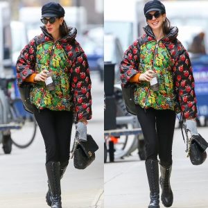 Anne Hathaway rocks patterned Moncler coat and leggings, heading to New York studio in casual style.
